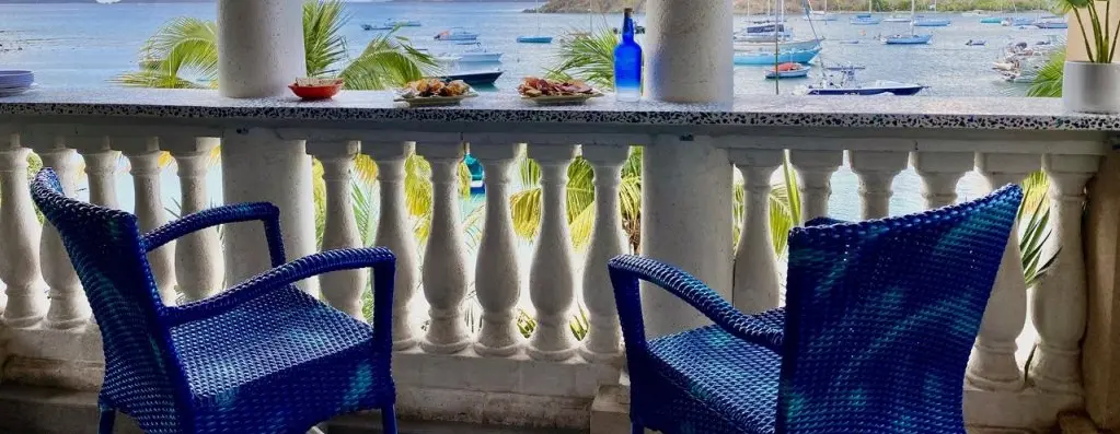 Blue chairs resort by the sea